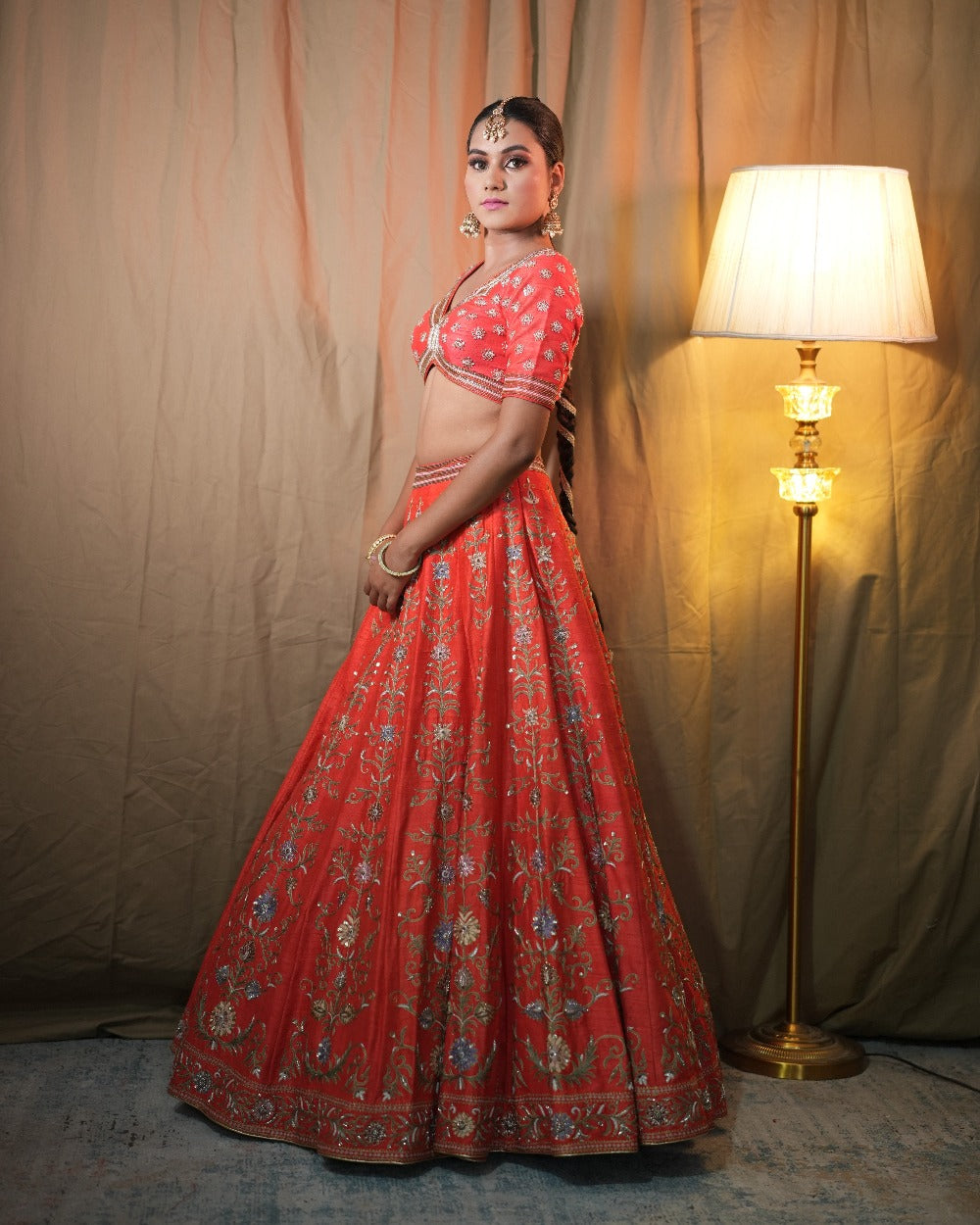 Orange Lehenga Set In Raw Silk With Hand Embroidered Motifs