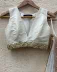 Ivory ruffle lehenga and raw silk blouse set - WaliaJones