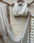 Ivory ruffle lehenga and raw silk blouse set - WaliaJones